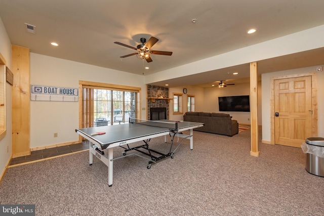 game room featuring a ceiling fan, baseboards, recessed lighting, a fireplace, and carpet