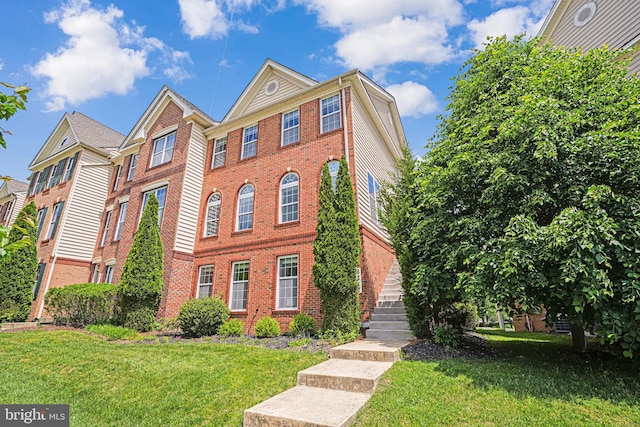 8217 Castanea Ln, Derwood, MD 20855 - view of front of house with brick siding and a front yard
