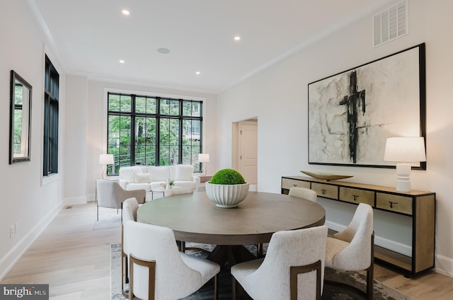 5024 Dana Pl NW, Washington, DC 20016 - dining room with light wood finished floors, baseboards, and recessed lighting
