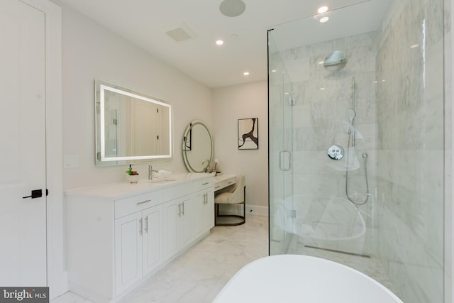 5024 Dana Pl NW, Washington, DC 20016 - bathroom featuring a marble finish shower, vanity, recessed lighting, marble finish floors, and baseboards