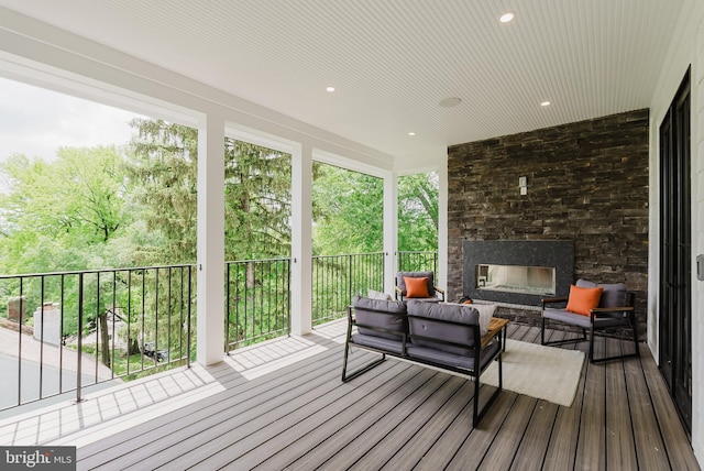 5024 Dana Pl NW, Washington, DC 20016 - wooden terrace with an outdoor living space with a fireplace