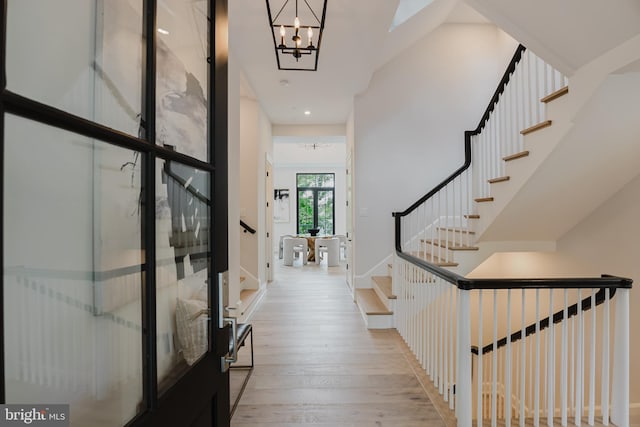 5024 Dana Pl NW, Washington, DC 20016 - foyer entrance featuring hardwood / wood-style floors, stairway, a chandelier, and recessed lighting