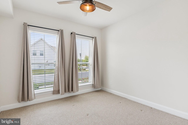 32157 Shorebreak Xing, Millville, DE 19967 - spare room featuring carpet floors, healthy amount of natural light, ceiling fan, and baseboards