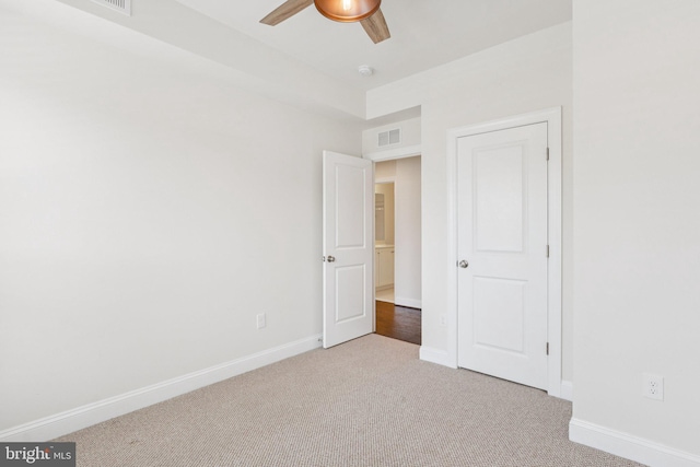 32157 Shorebreak Xing, Millville, DE 19967 - unfurnished bedroom with carpet, baseboards, and ceiling fan