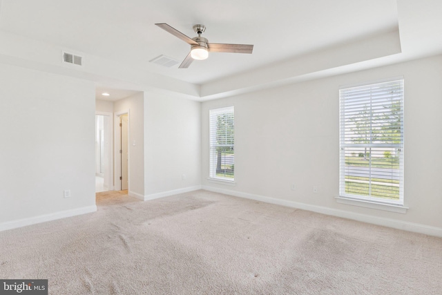 32157 Shorebreak Xing, Millville, DE 19967 - spare room featuring light colored carpet, baseboards, and ceiling fan
