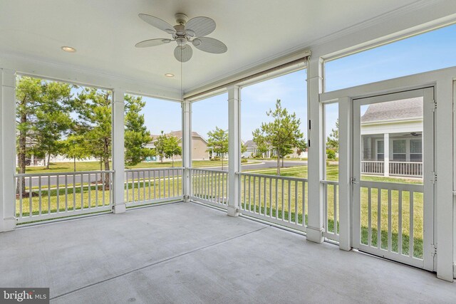 32157 Shorebreak Xing, Millville, DE 19967 - unfurnished sunroom with ceiling fan and a residential view