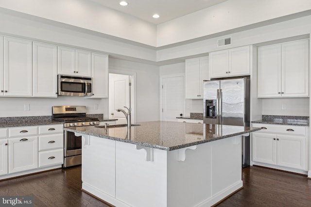 32157 Shorebreak Xing, Millville, DE 19967 - kitchen with stainless steel appliances, a sink, white cabinetry, and recessed lighting