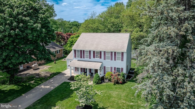 600 Trenton Rd, Langhorne, PA 19047 - view of front of property featuring a front yard, driveway, roof with shingles, and a view of trees