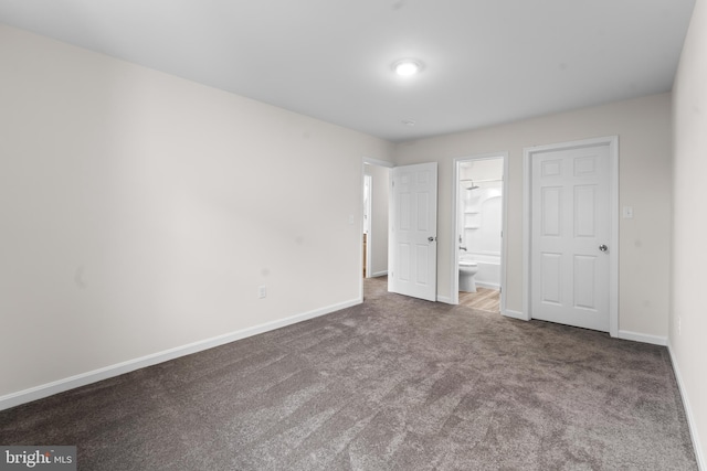 662 W Side Dr Unit 1-H, Gaithersburg, MD 20878 - unfurnished bedroom featuring carpet flooring, baseboards, and connected bathroom