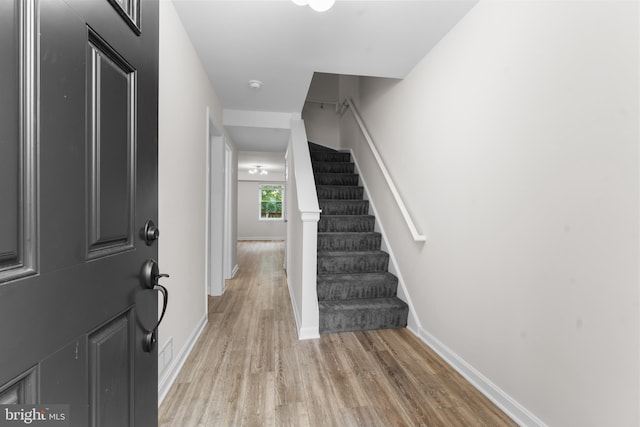 662 W Side Dr Unit 1-H, Gaithersburg, MD 20878 - foyer featuring light wood-style floors, stairway, and baseboards