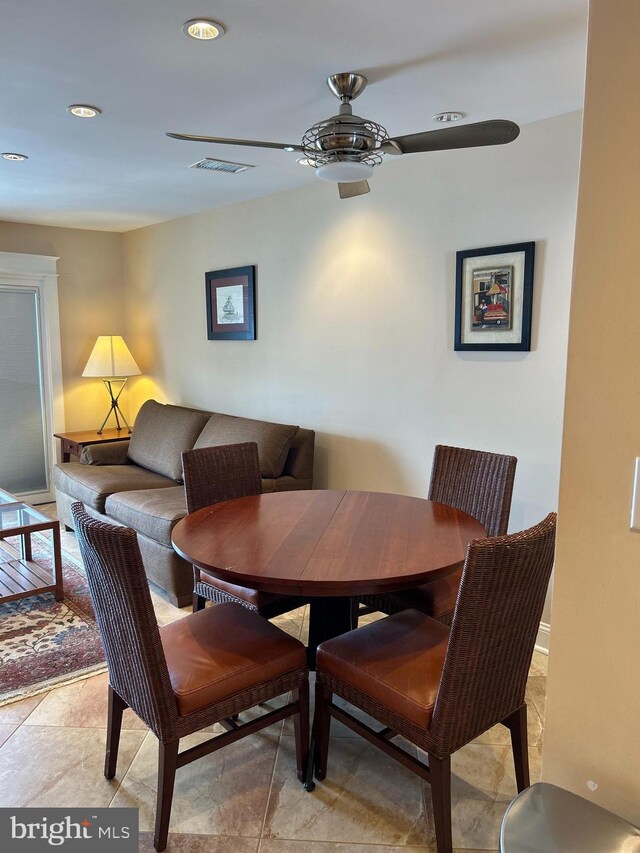 dining room with ceiling fan and recessed lighting