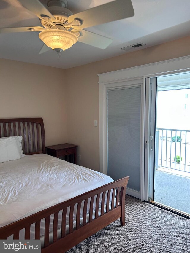 bedroom with access to exterior, carpet flooring, and ceiling fan