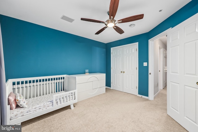 1510 Northern Neck Dr Unit 102, Vienna, VA 22182 - bedroom with carpet, a closet, a nursery area, a ceiling fan, and baseboards