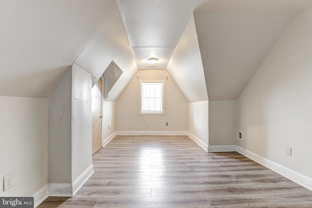 3622 Springdale Ave, Baltimore, MD 21216 - bonus room featuring light wood-style floors, vaulted ceiling, and baseboards