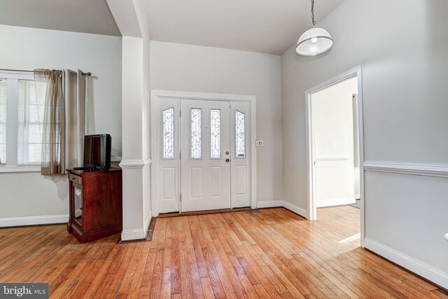 3622 Springdale Ave, Baltimore, MD 21216 - foyer entrance with healthy amount of natural light, light wood-type flooring, and baseboards