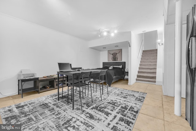 office space with tile patterned flooring and ornamental molding