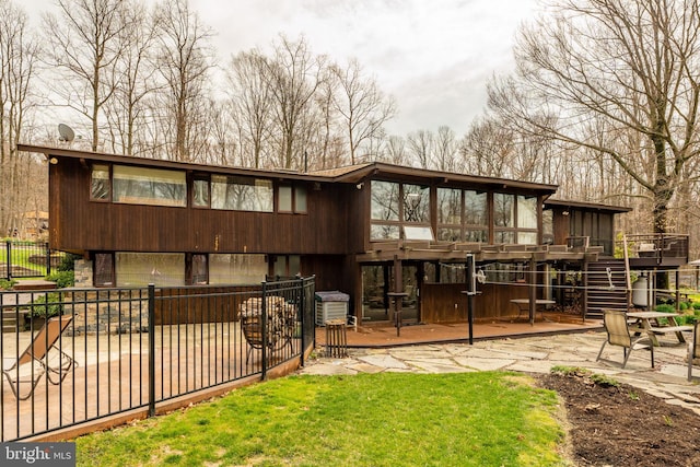 1220 Morgantown Rd, Morgantown, PA 19543 - back of property featuring fence, a deck, a patio, and stairs