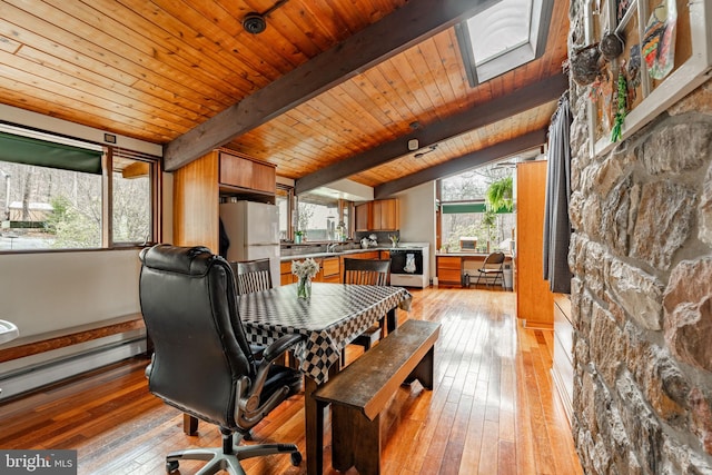 1220 Morgantown Rd, Morgantown, PA 19543 - dining space featuring wooden ceiling, light wood finished floors, and a baseboard radiator