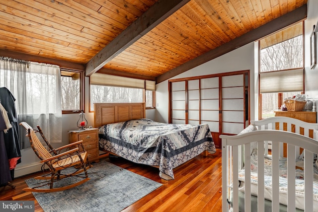 1220 Morgantown Rd, Morgantown, PA 19543 - bedroom with wood-type flooring, multiple windows, and wooden ceiling