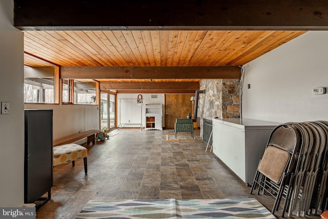1220 Morgantown Rd, Morgantown, PA 19543 - living room featuring beamed ceiling, stone finish flooring, and wood ceiling