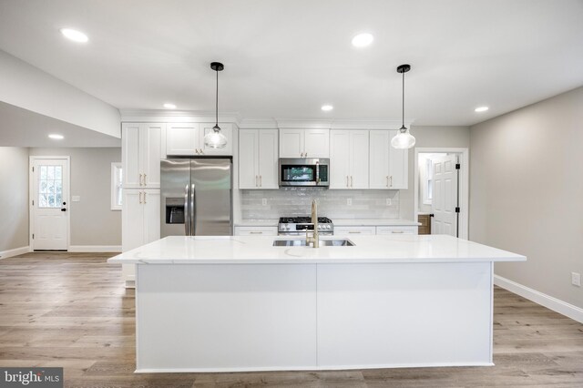 1985 W Blvd, Malaga, NJ 08328 - kitchen with appliances with stainless steel finishes, a sink, baseboards, white cabinets, and recessed lighting