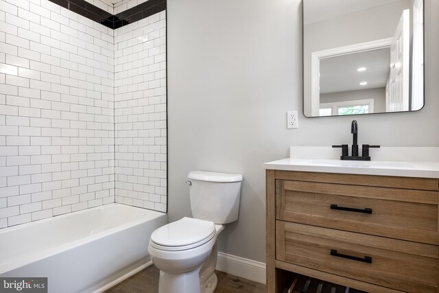 1985 W Blvd, Malaga, NJ 08328 - full bathroom with toilet, vanity, wood finished floors, and baseboards