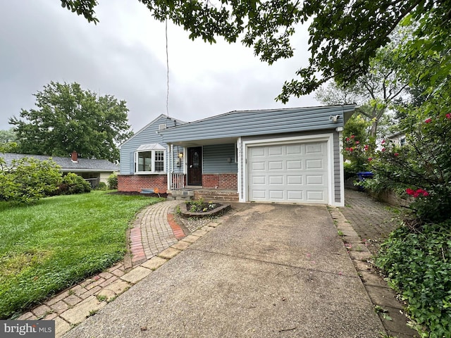 3321 Clay St, Silver Spring, MD 20902 - view of front of house with brick siding, an attached garage, concrete driveway, and a front lawn