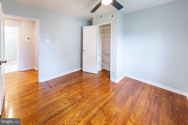 3321 Clay St, Silver Spring, MD 20902 - unfurnished bedroom featuring wood finished floors, baseboards, a closet, and a ceiling fan