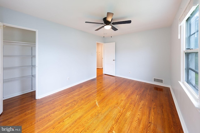 3321 Clay St, Silver Spring, MD 20902 - unfurnished bedroom featuring light wood-style floors, a closet, baseboards, and ceiling fan