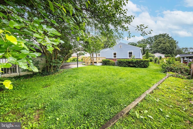 3321 Clay St, Silver Spring, MD 20902 - view of grassy yard featuring a deck
