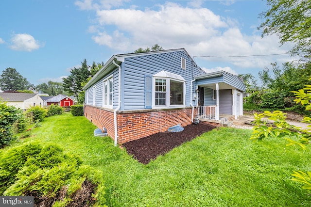 3321 Clay St, Silver Spring, MD 20902 - bungalow-style house with a front yard and brick siding