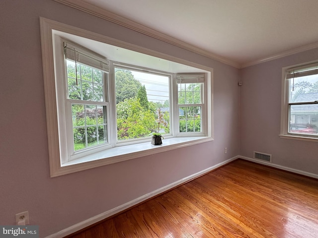 3321 Clay St, Silver Spring, MD 20902 - unfurnished room with baseboards, light wood-style floors, and crown molding