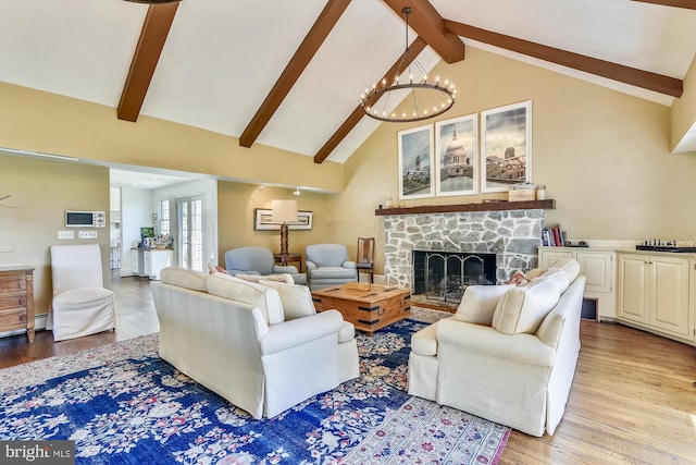 6437 Blantyre, Warrenton, VA 20187 - living room featuring beam ceiling, a chandelier, a baseboard heating unit, light wood-style floors, and a fireplace
