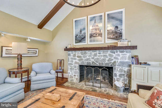 6437 Blantyre, Warrenton, VA 20187 - living area with wood finished floors, lofted ceiling, baseboard heating, a fireplace, and baseboards