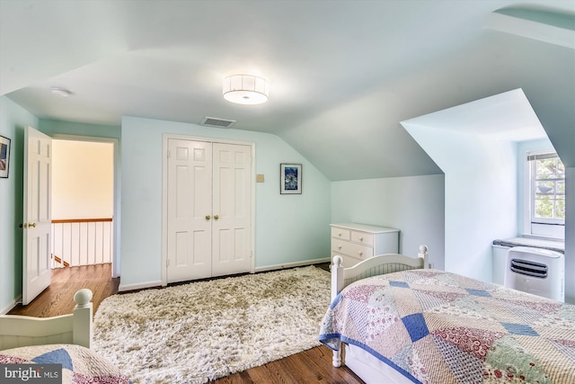 6437 Blantyre, Warrenton, VA 20187 - bedroom with wood finished floors, lofted ceiling, a closet, and baseboards