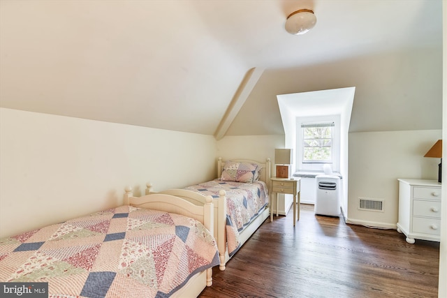 6437 Blantyre, Warrenton, VA 20187 - bedroom featuring lofted ceiling and wood finished floors