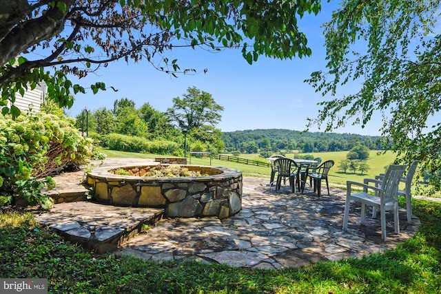 6437 Blantyre, Warrenton, VA 20187 - view of patio with an outdoor fire pit and fence