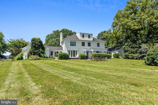 6437 Blantyre, Warrenton, VA 20187 - rear view of house with a yard and a chimney