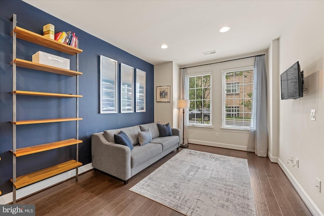 20383 Codman Dr, Ashburn, VA 20147 - living area featuring dark wood-style floors, baseboards, and recessed lighting