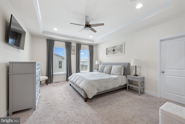 20383 Codman Dr, Ashburn, VA 20147 - bedroom with a tray ceiling, light colored carpet, recessed lighting, baseboards, and a ceiling fan