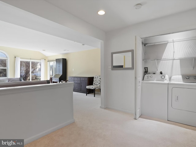2 Darnell Ct, Olney, MD 20832 - living area with washer and dryer, light carpet, baseboards, and lofted ceiling