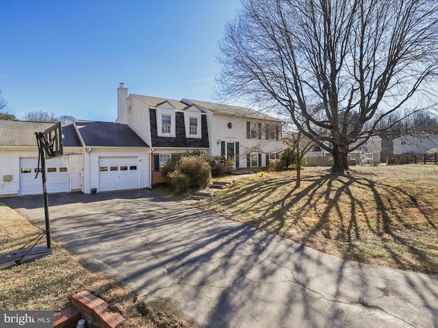 2 Darnell Ct, Olney, MD 20832 - view of front of property featuring asphalt driveway, a chimney, and an attached garage