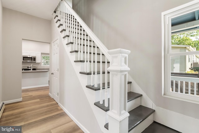 407 Lingle St, Osceola Mills, PA 16666 - staircase with wood finished floors and baseboards