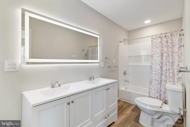 407 Lingle St, Osceola Mills, PA 16666 - full bath with wood finished floors, double vanity, and shower / bath combination with curtain
