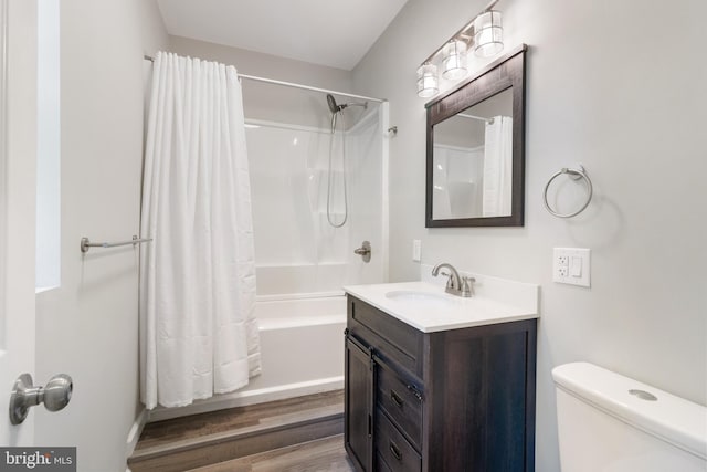 407 Lingle St, Osceola Mills, PA 16666 - bathroom featuring vanity, shower / bath combo with shower curtain, and wood finished floors