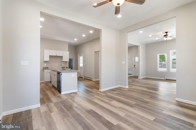 407 Lingle St, Osceola Mills, PA 16666 - kitchen with a ceiling fan, open floor plan, white cabinets, recessed lighting, and plenty of natural light