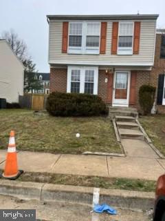 view of front of property with brick siding