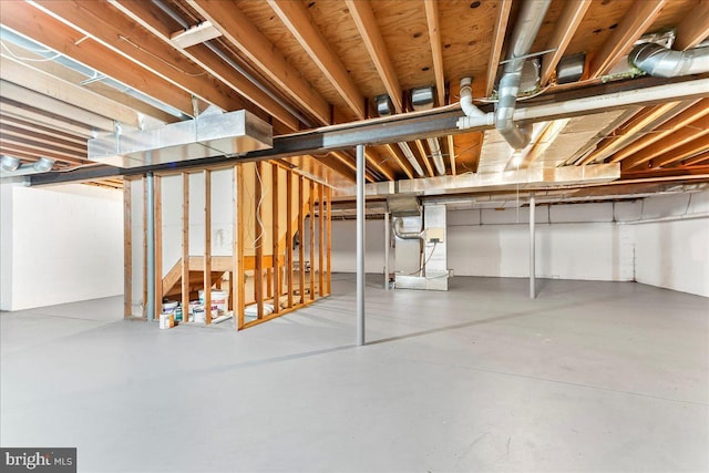 unfinished basement with heating unit