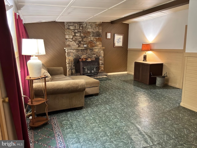 5580 Back Hollow Rd, Blain, PA 17006 - living room featuring tile patterned floors, baseboards, and wood walls