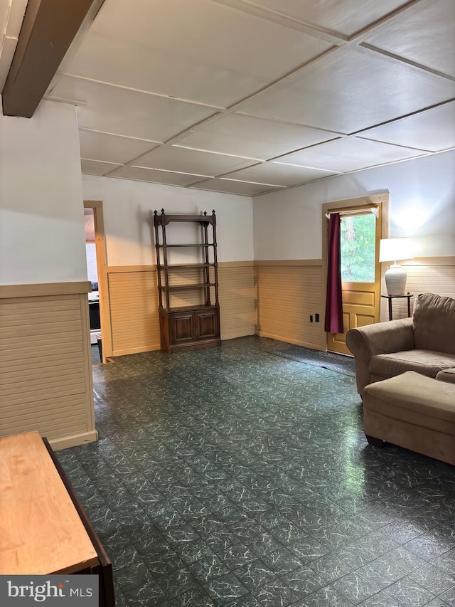 5580 Back Hollow Rd, Blain, PA 17006 - living room featuring a wainscoted wall and a drop ceiling